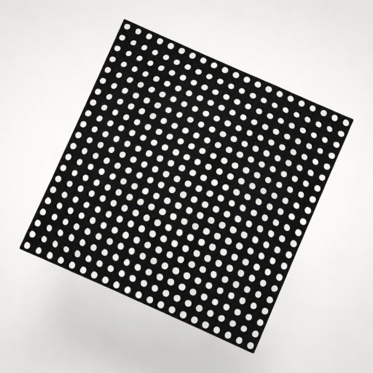 Angled product view of the black 188 × 188 mm Base Module, featuring the perforated grid used to connect NG Organisers walls and inserts.