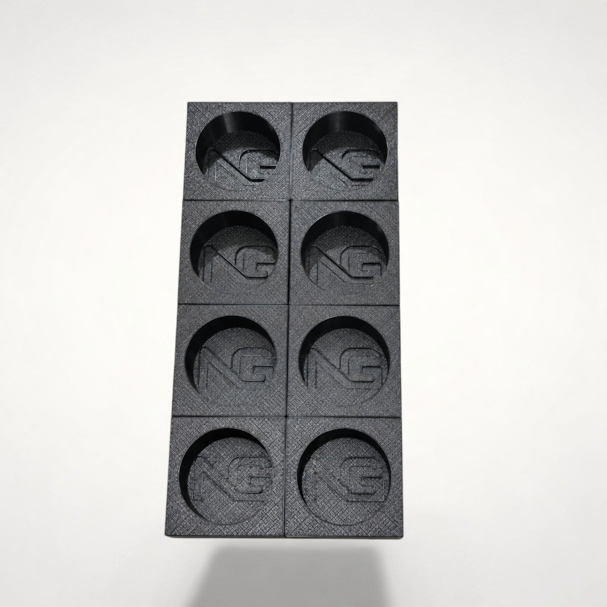 NG Organisers black coffee pod holder for 8 Dolce Gusto pods with a textured finish and embossed logo
