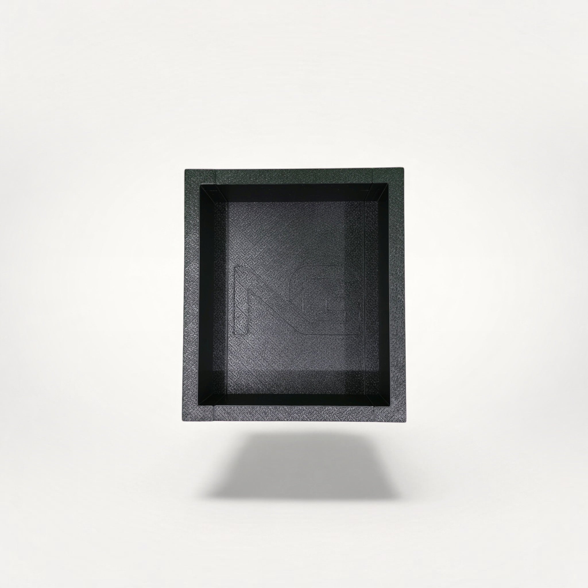 NG Organisers black modular storage box with a textured finish and embossed logo on a white background.