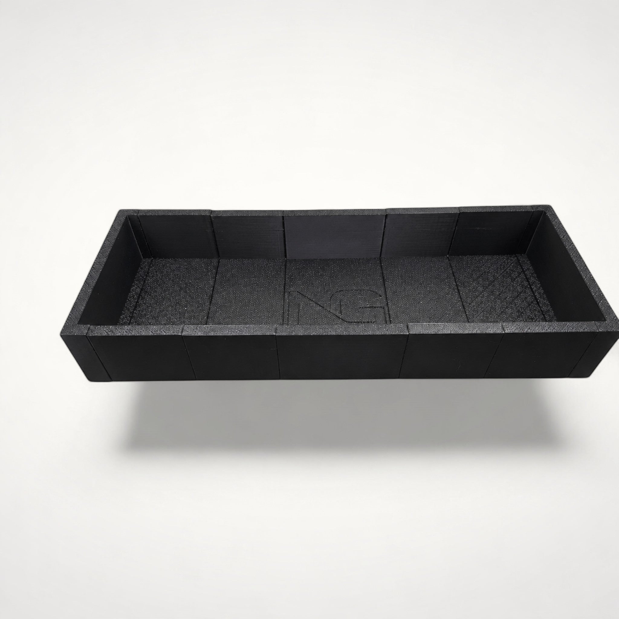 NG Organisers black 3D-printed modular drawer storage box with a textured finish and branded centre module.