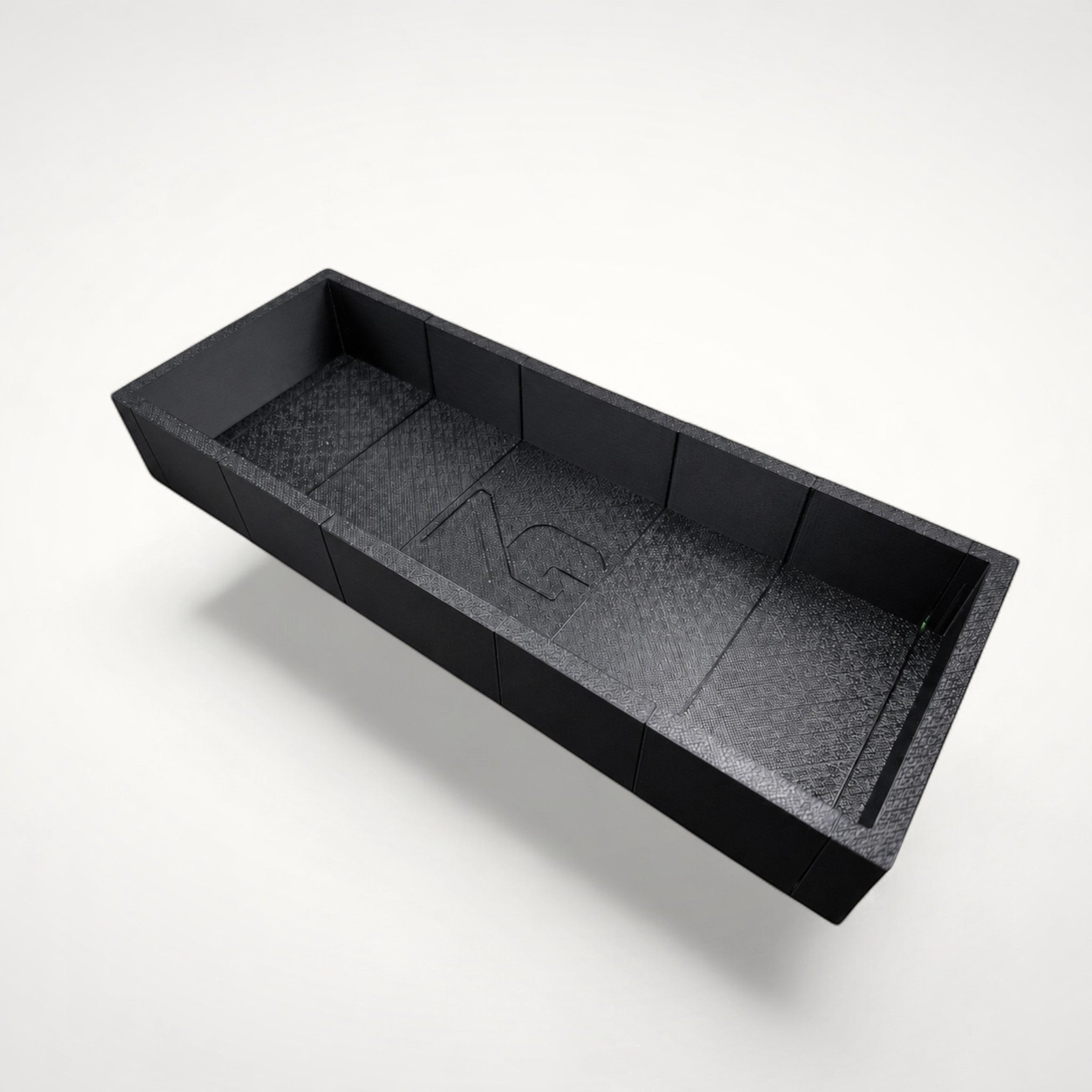 NG Organisers black 3D-printed modular drawer storage box with a textured finish and branded centre module.