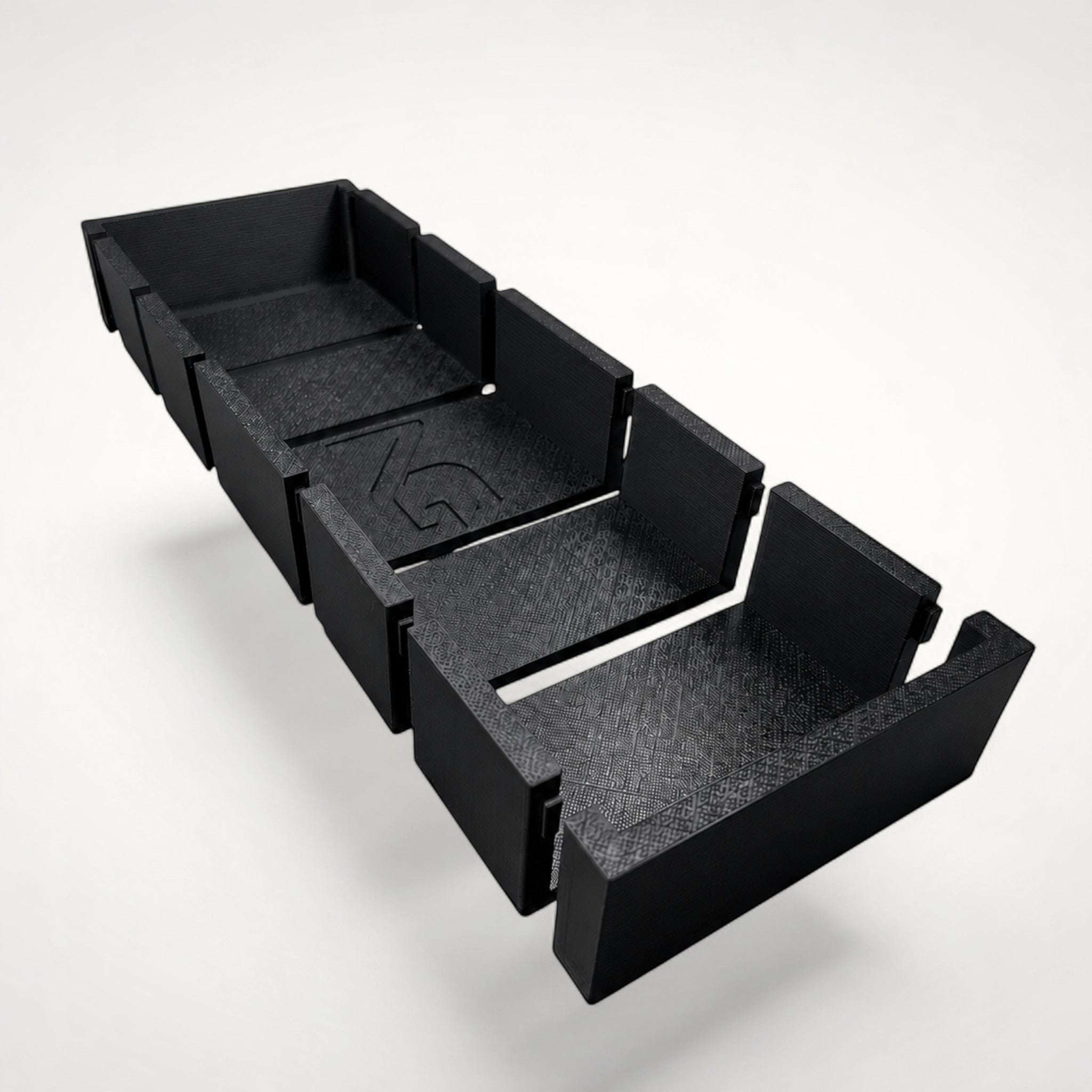 NG Organisers black 3D-printed modular drawer storage box with a textured finish and branded centre module.