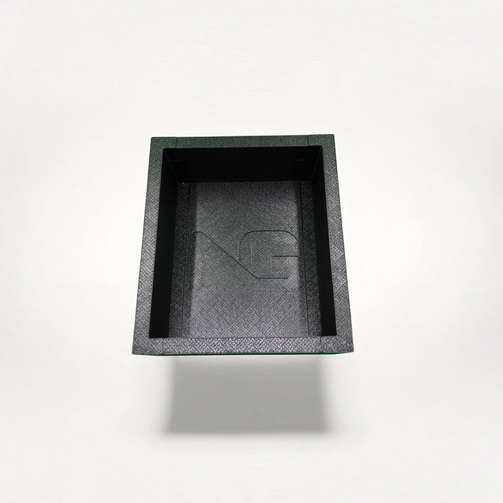 NG Organisers black modular storage box with textured surface and embossed logo on a white background
