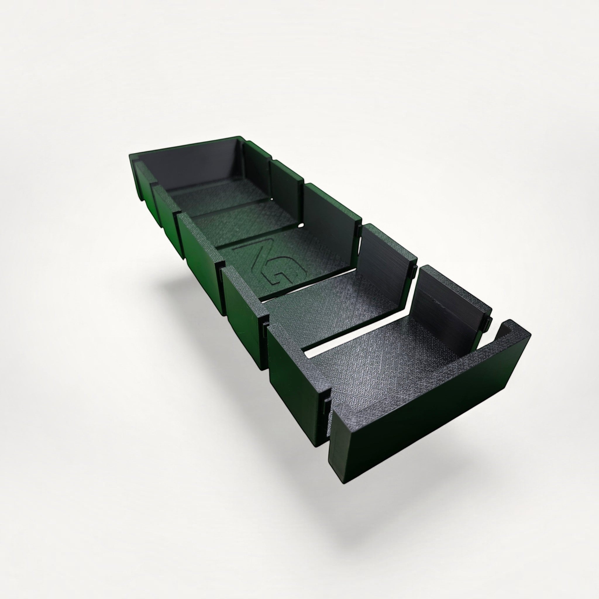 NG Organisers black modular storage box with interlocking sections and embossed logo on a white background
