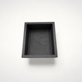 NG Organisers black modular storage box with textured finish and embossed logo for drawer organisation.