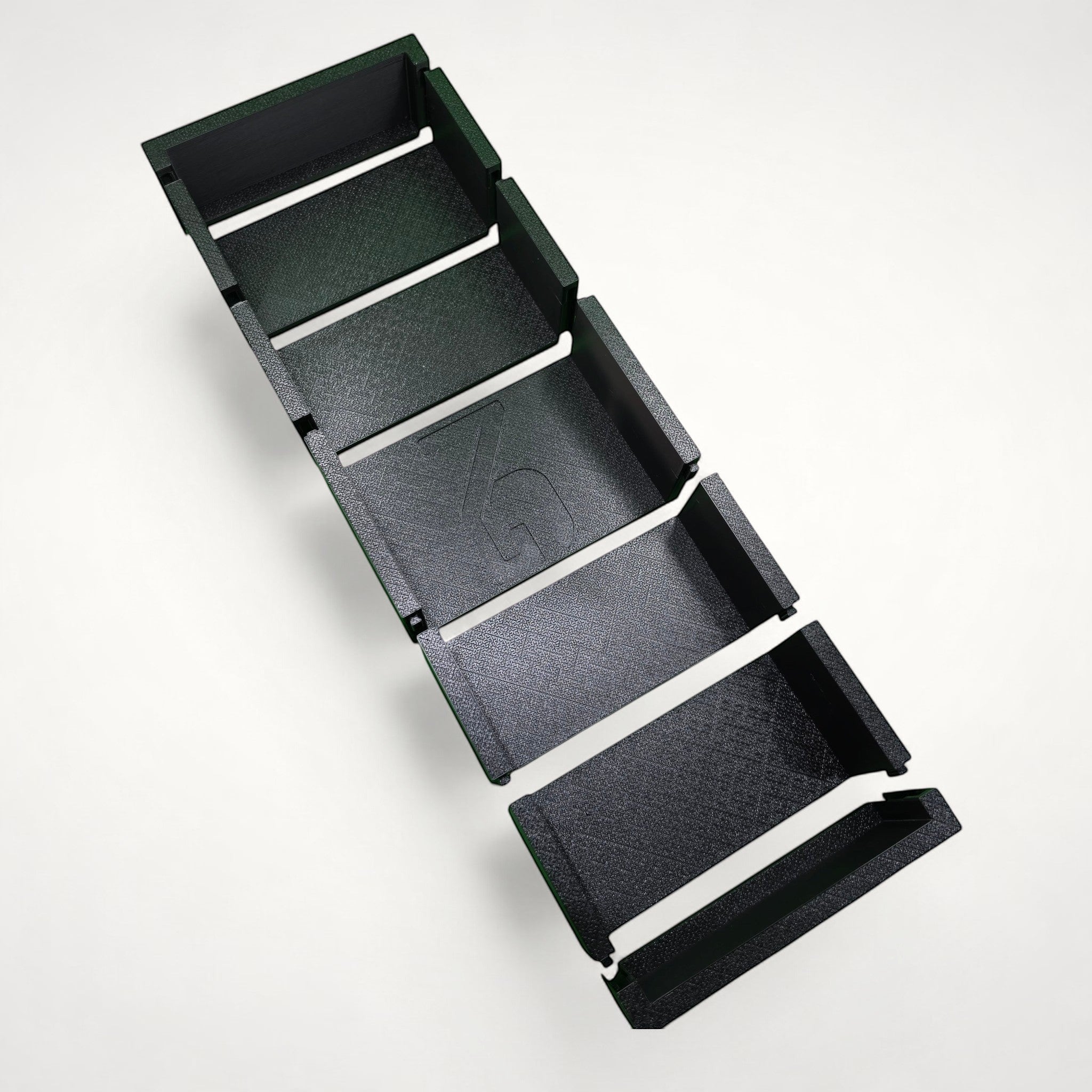 NG Organisers black modular storage box with interlocking sections for custom drawer organization.