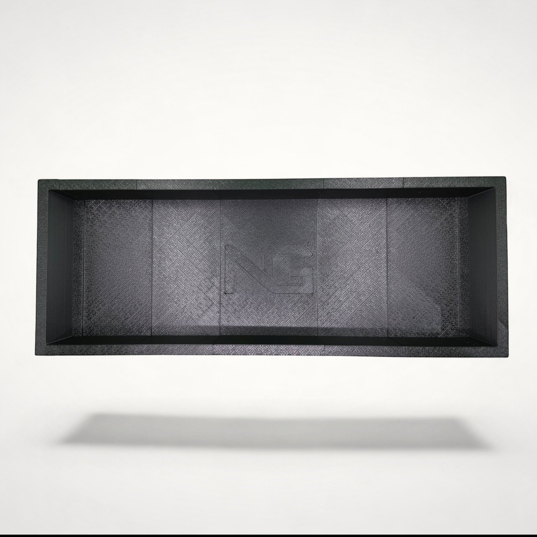 NG Organisers black rectangular modular storage box with a textured finish and embossed logo on the base.