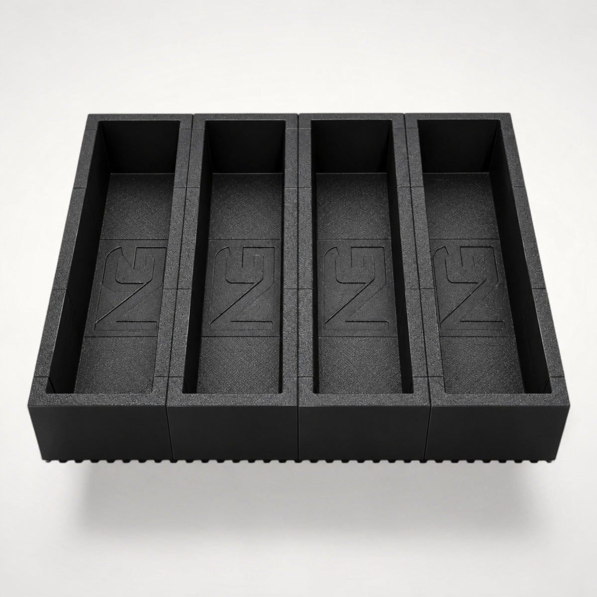 NG Organisers black plastic cutlery drawer tray with four compartments and a textured finish