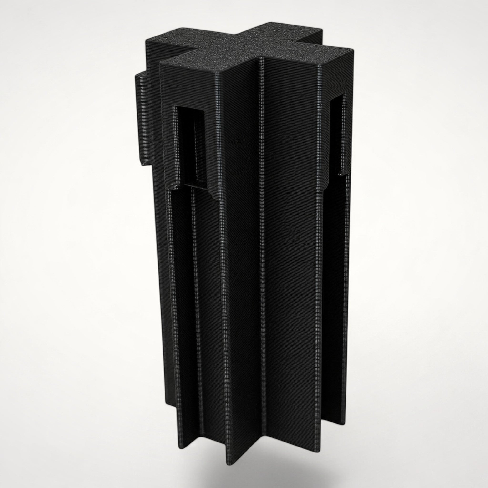 NG Organisers black cross-shaped wall module for creating four-way drawer divider intersections.