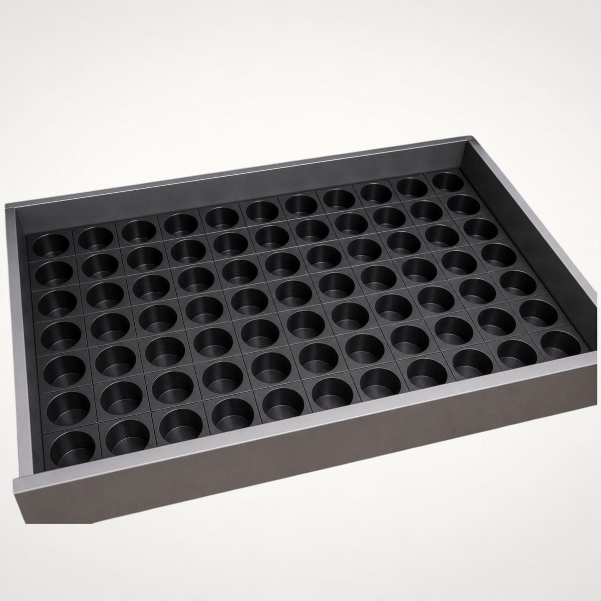 NG Organisers modular drawer insert for Dolce Gusto coffee pods in a sleek dark grey finish for kitchen storage.