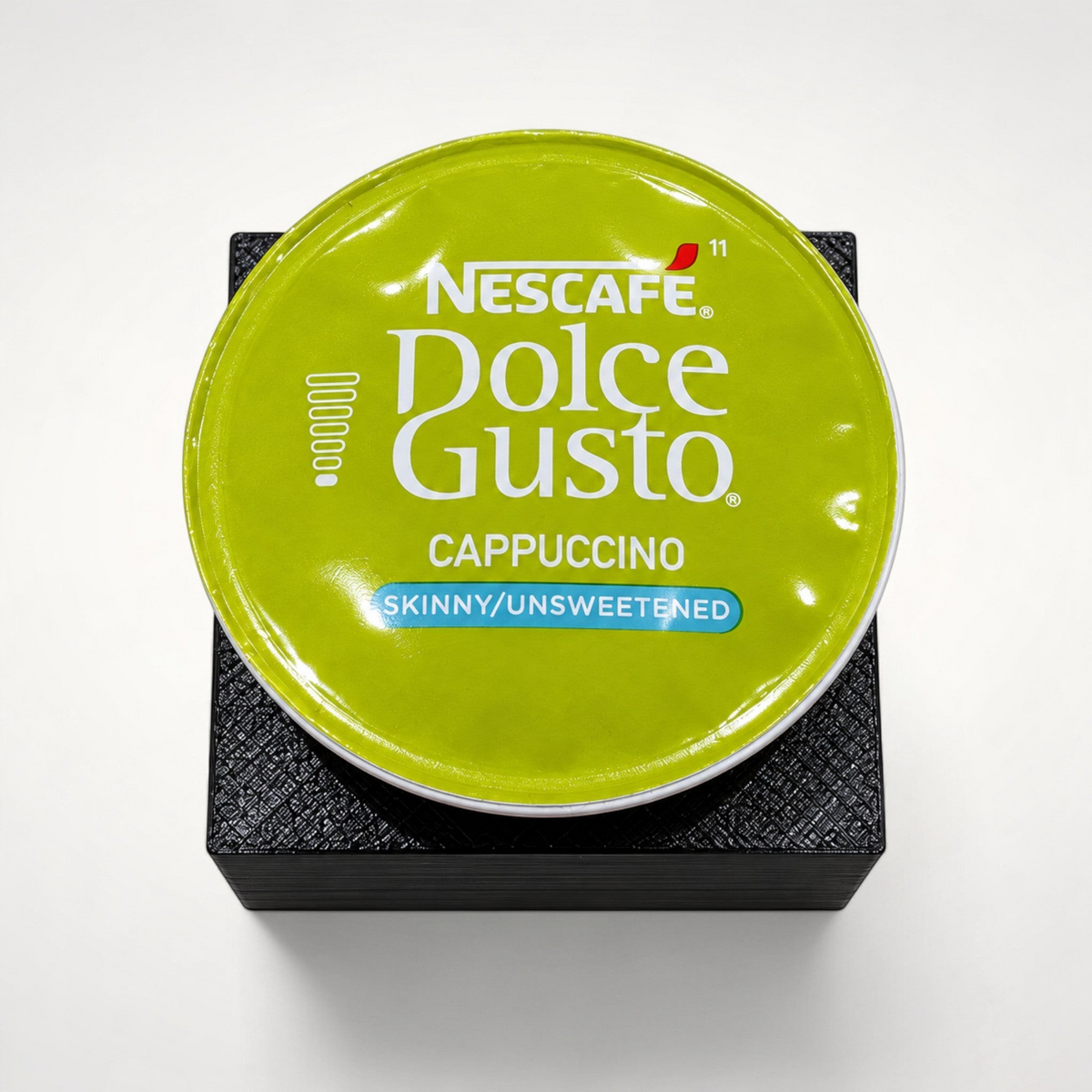 NG Organisers black modular drawer insert holding a green Dolce Gusto Cappuccino coffee pod
