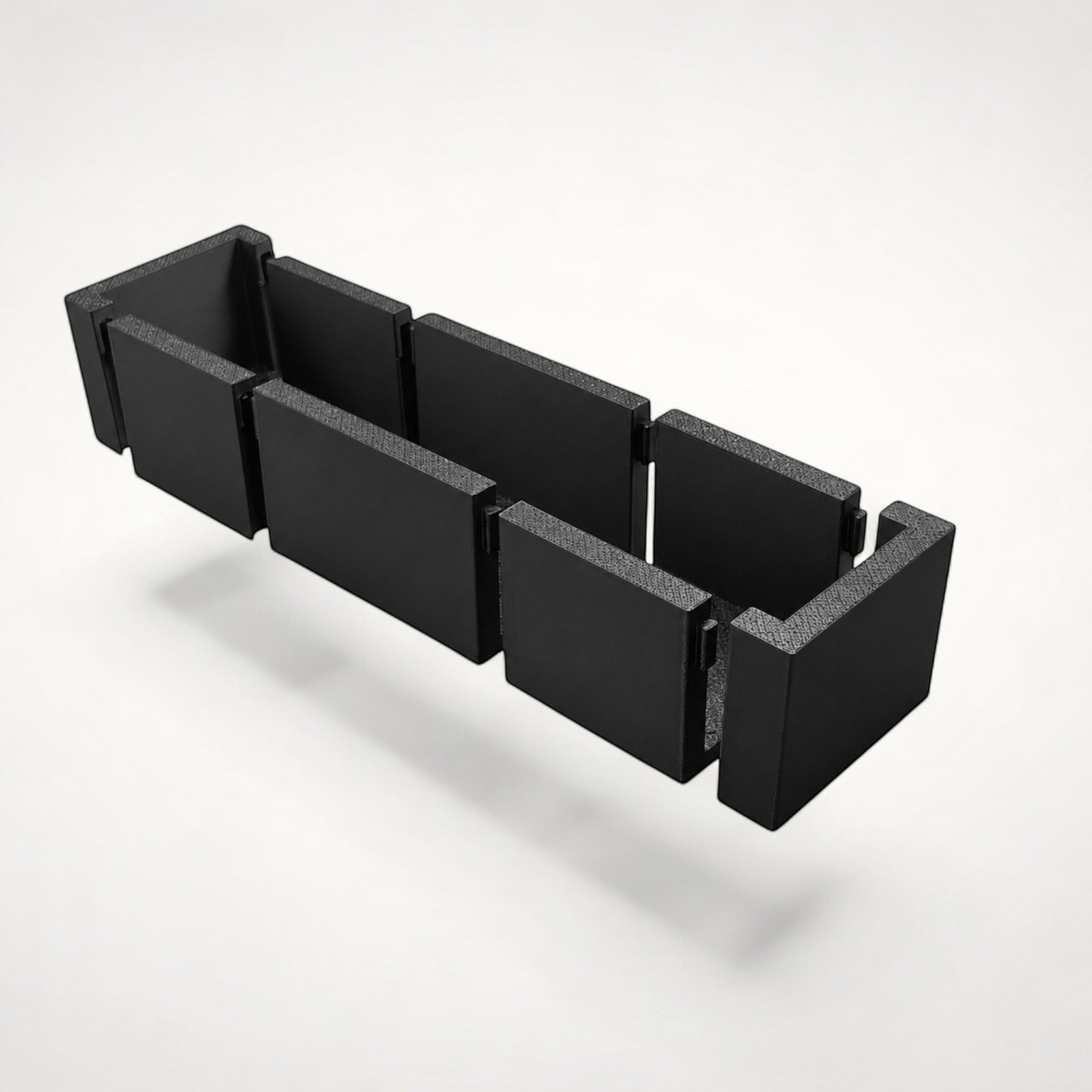 NG Organisers modular black storage box insert for drawers, featuring a slim, expandable five-piece assembly.