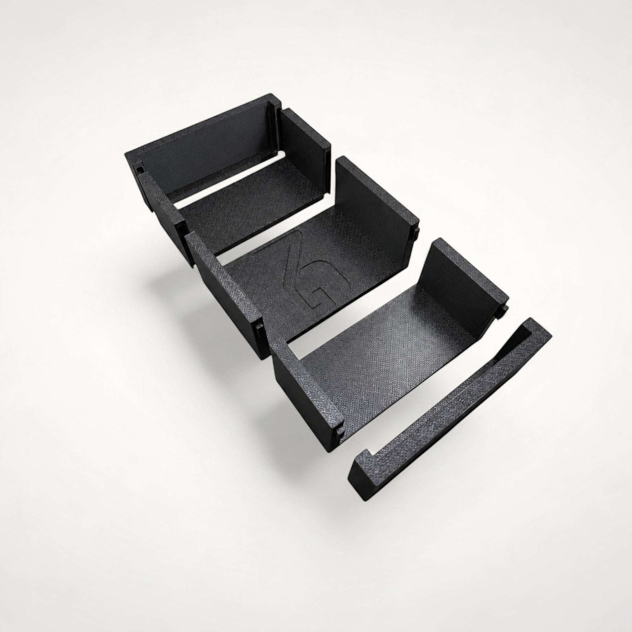 NG Organisers modular black storage box components disassembled on a white background.
