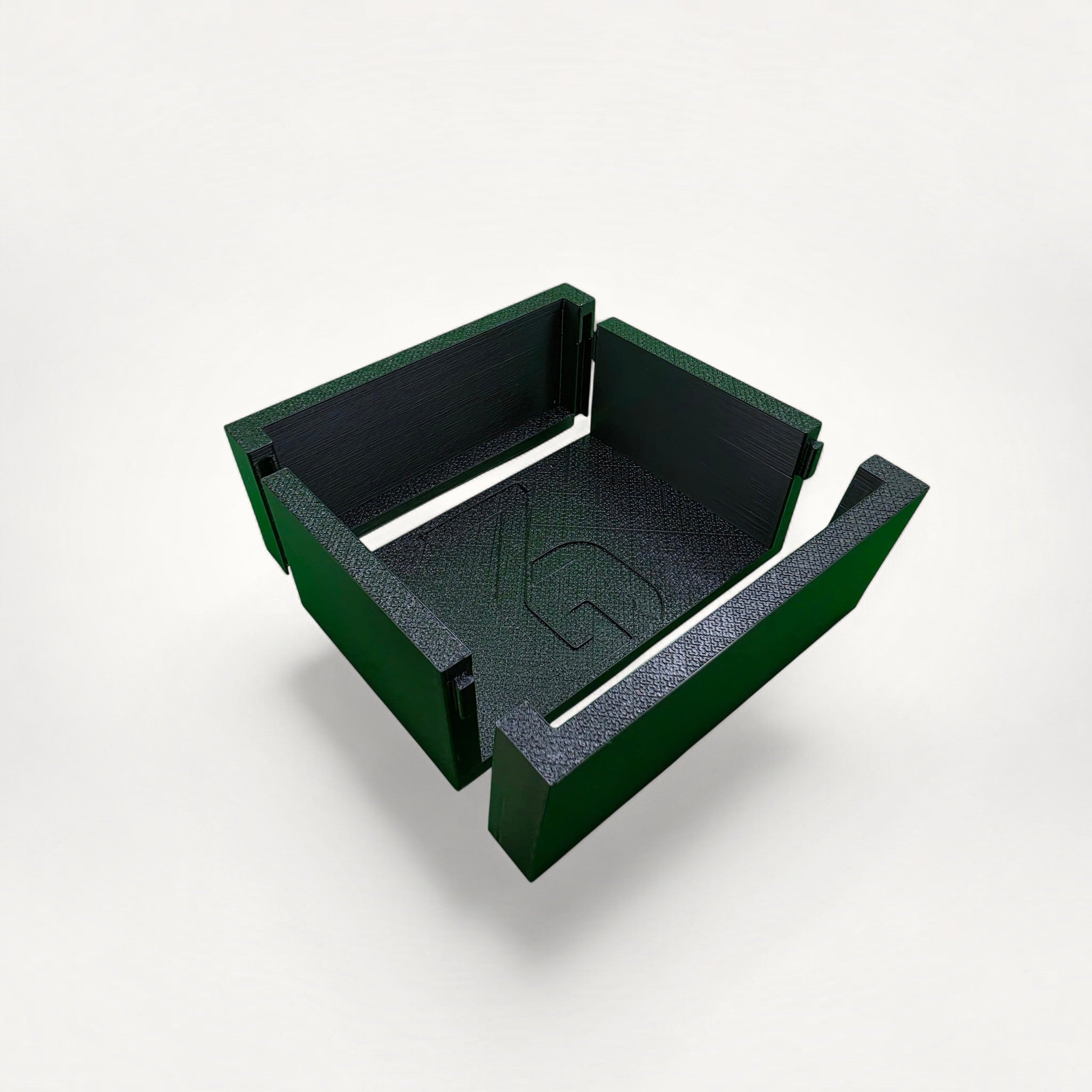 NG Organisers modular box in dark green with textured finish and embossed logo on a white background