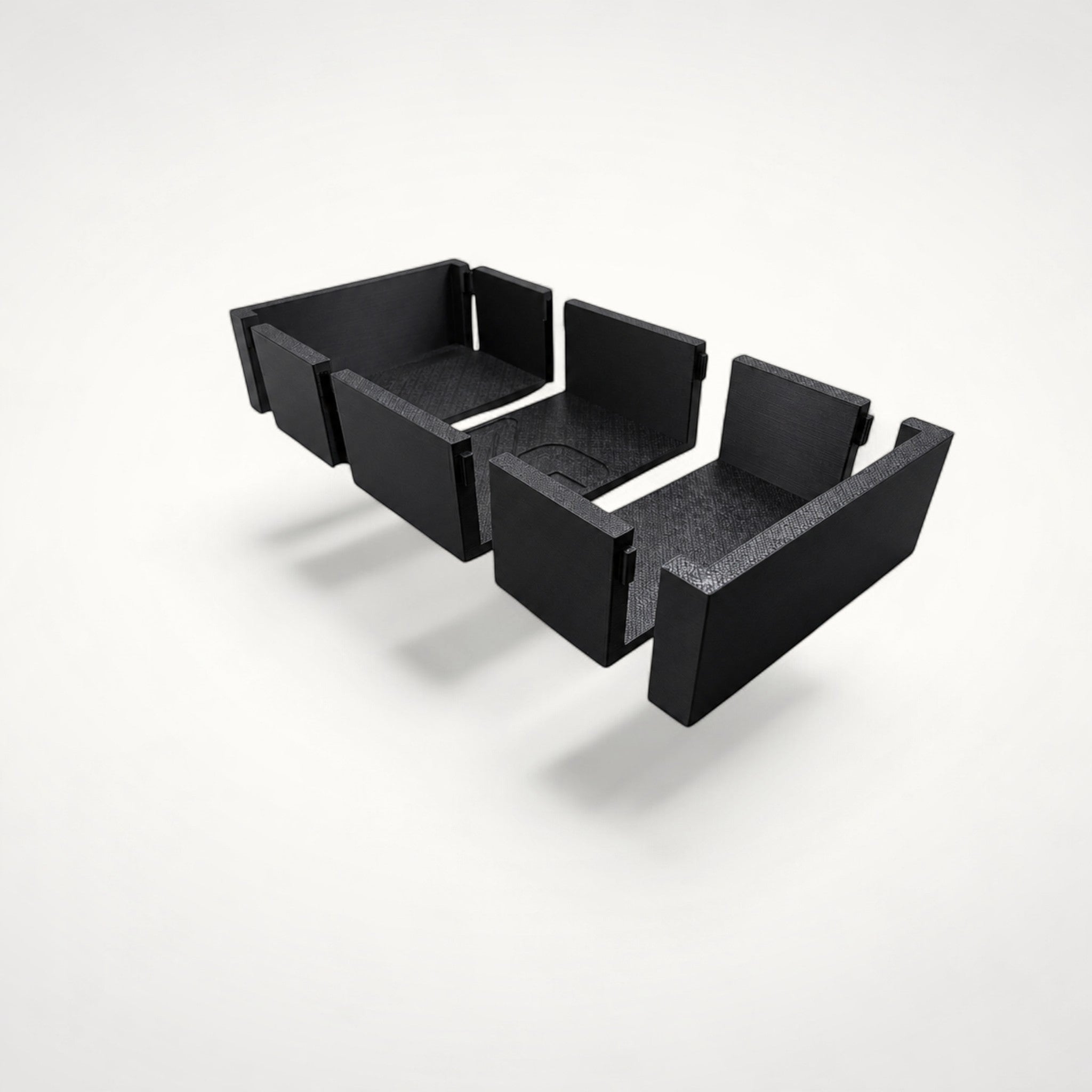 NG Organisers black modular storage box components for drawer organisation on a white background.
