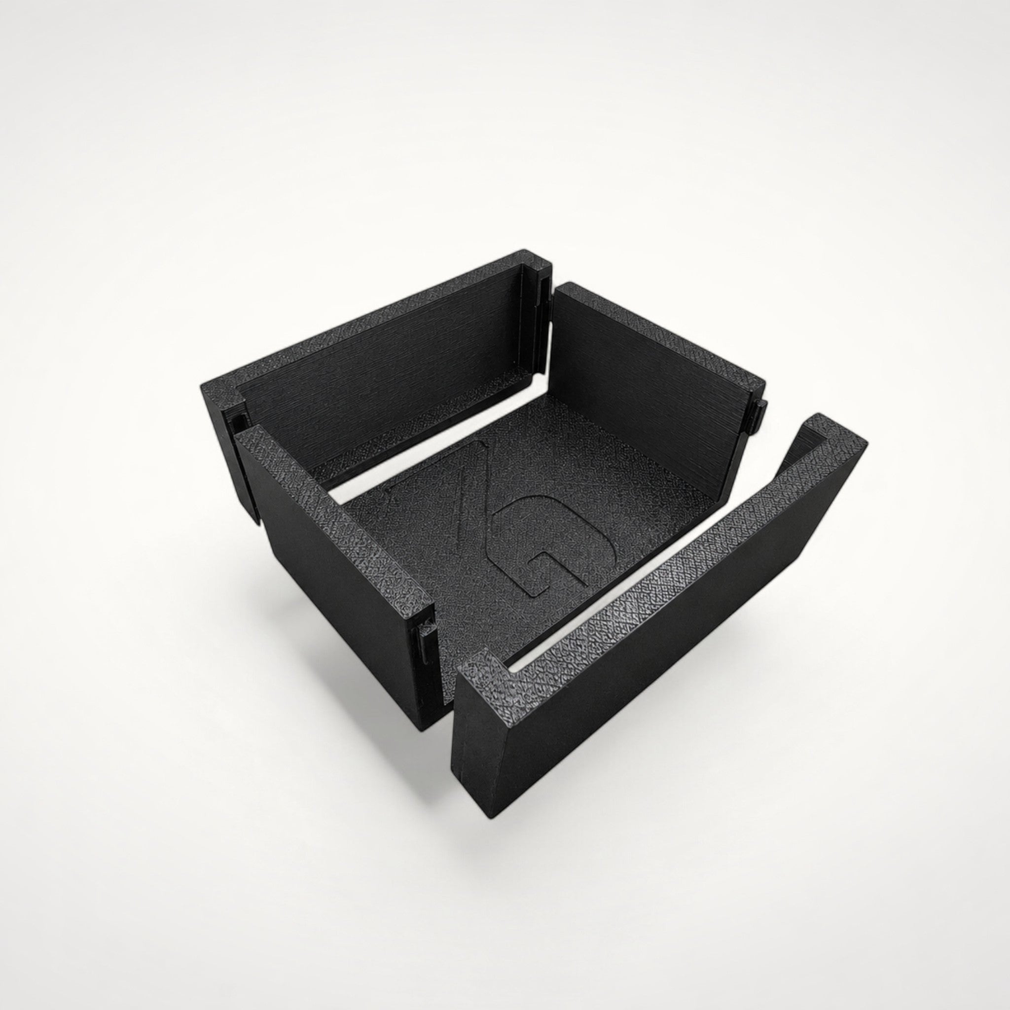 NG Organisers black modular storage box insert with branded base and interlocking edge components.