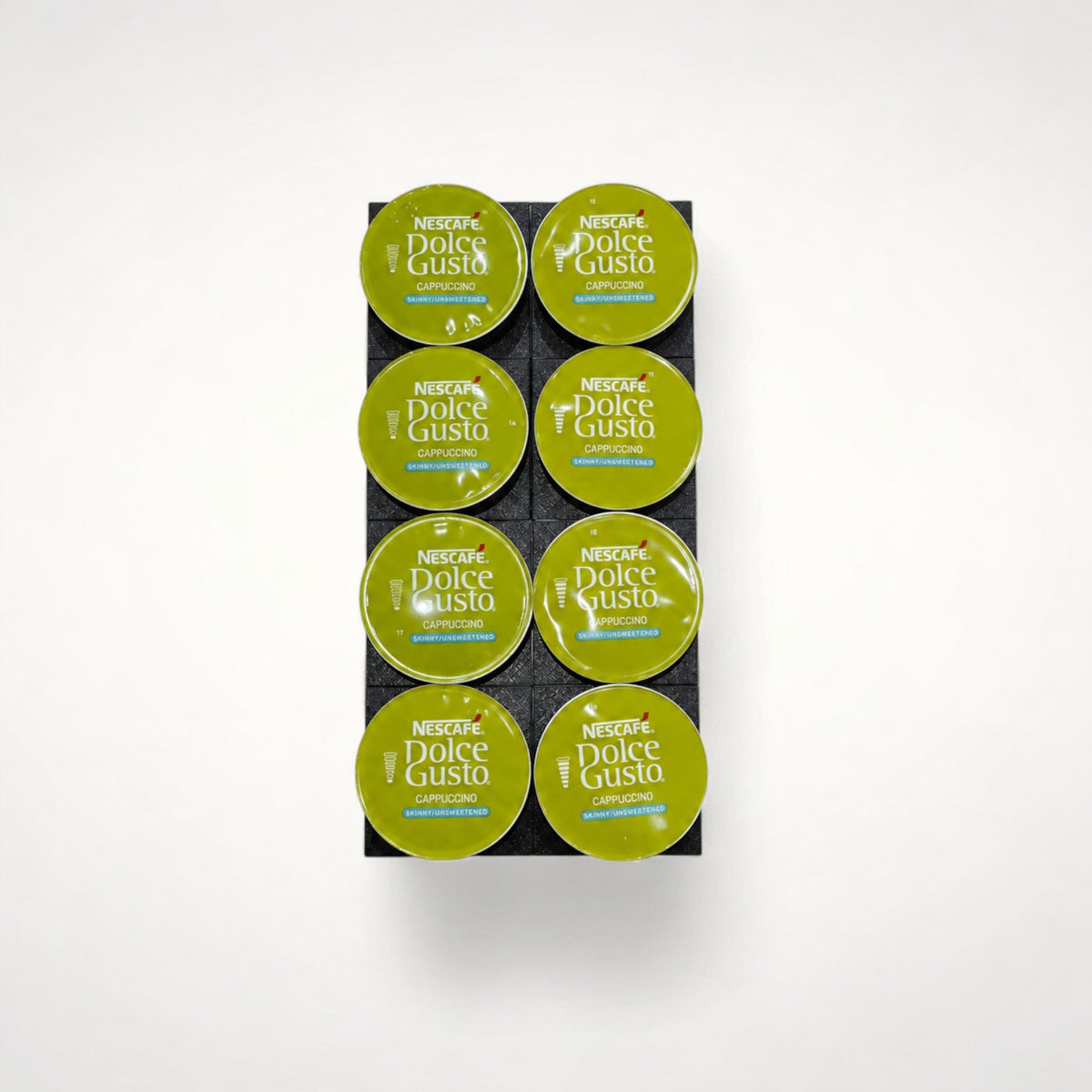 NG Organisers small coffee pod storage kit holding eight green Dolce Gusto capsules in a black modular base