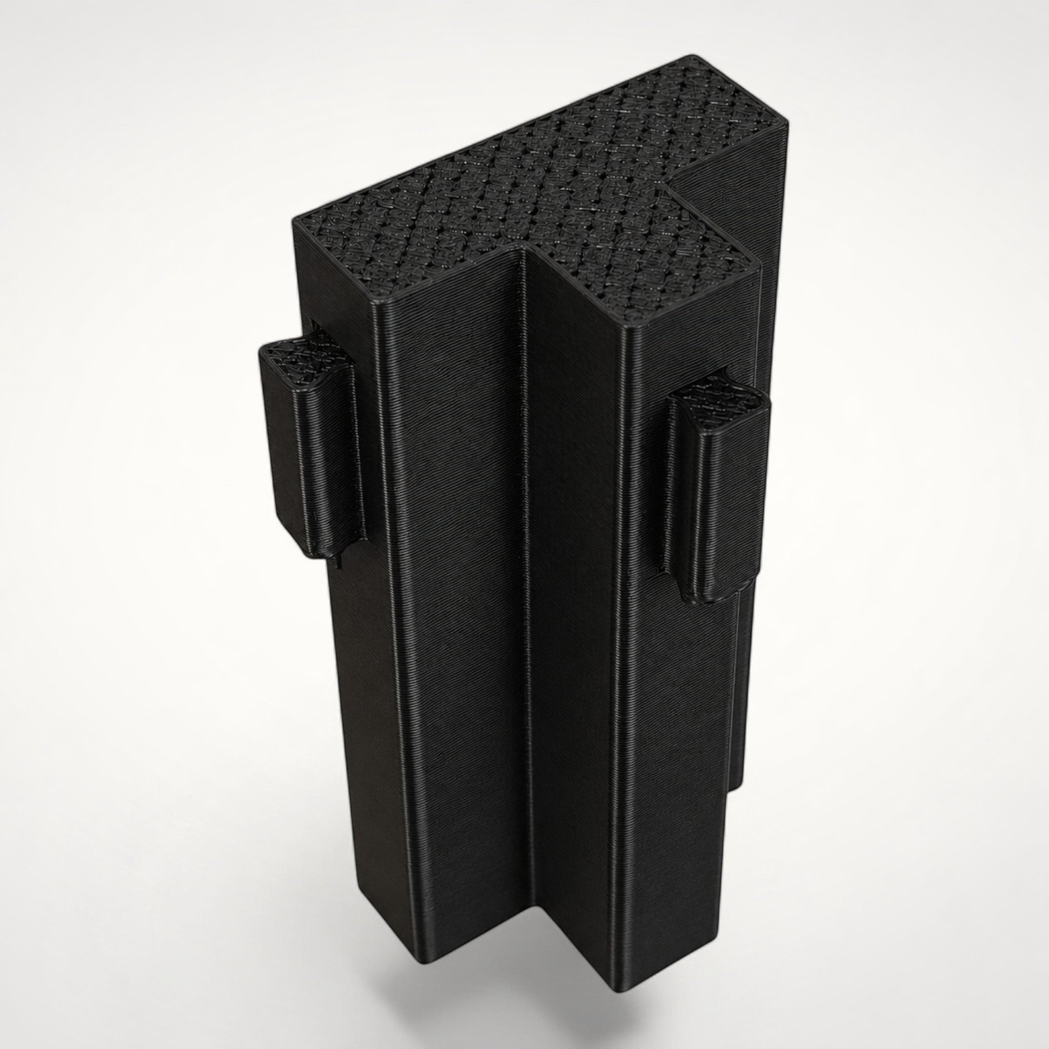 NG Organisers black T-shaped double male wall module for drawer divider systems with a textured top surface.
